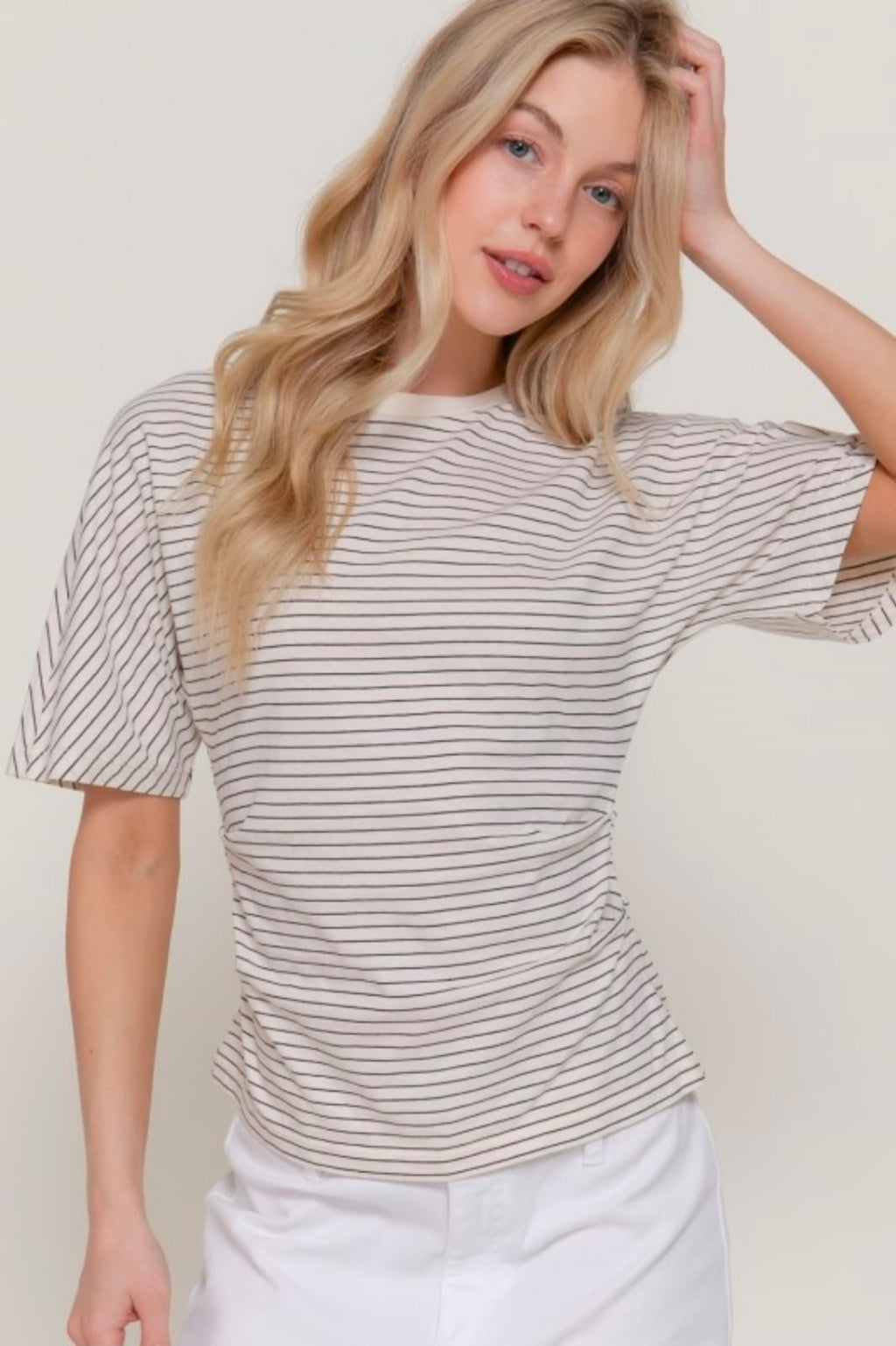 Blusa rayitas crema