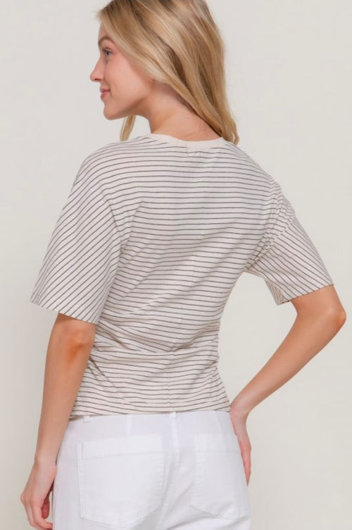 Blusa rayitas crema