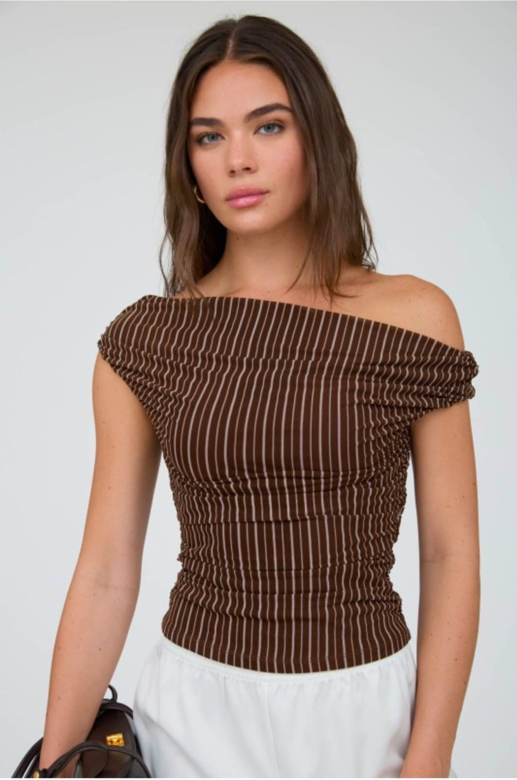 Blusa rayitas café